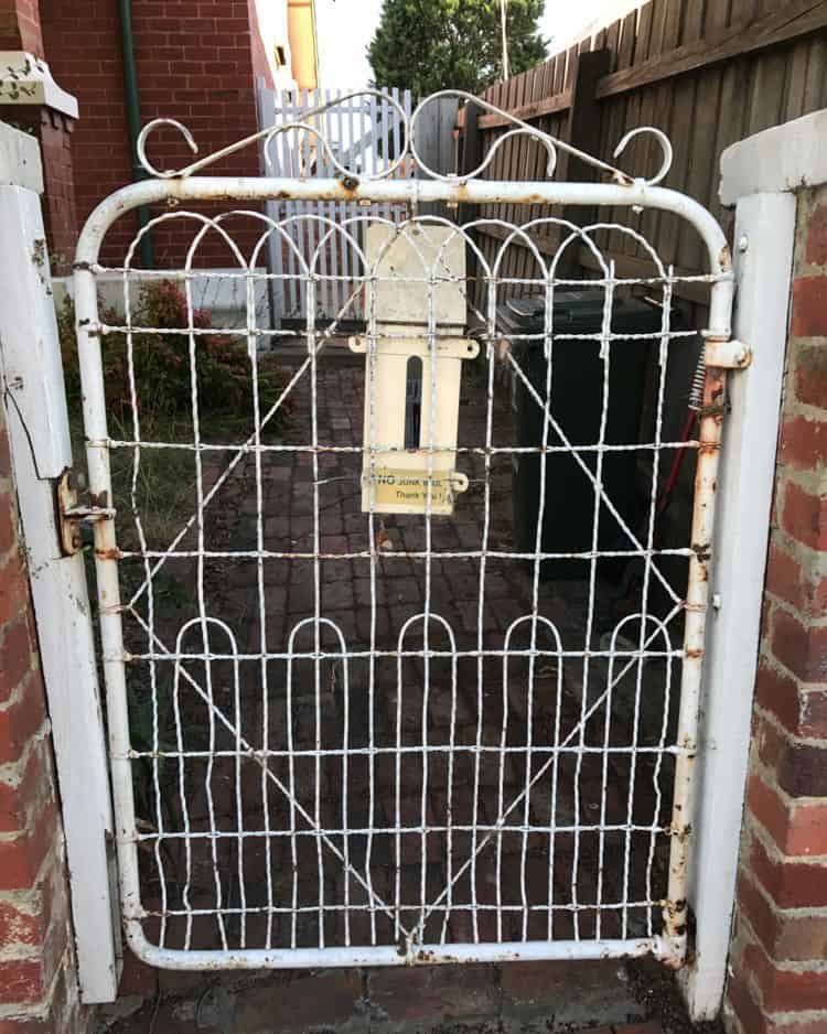 Old iron gate letterbox