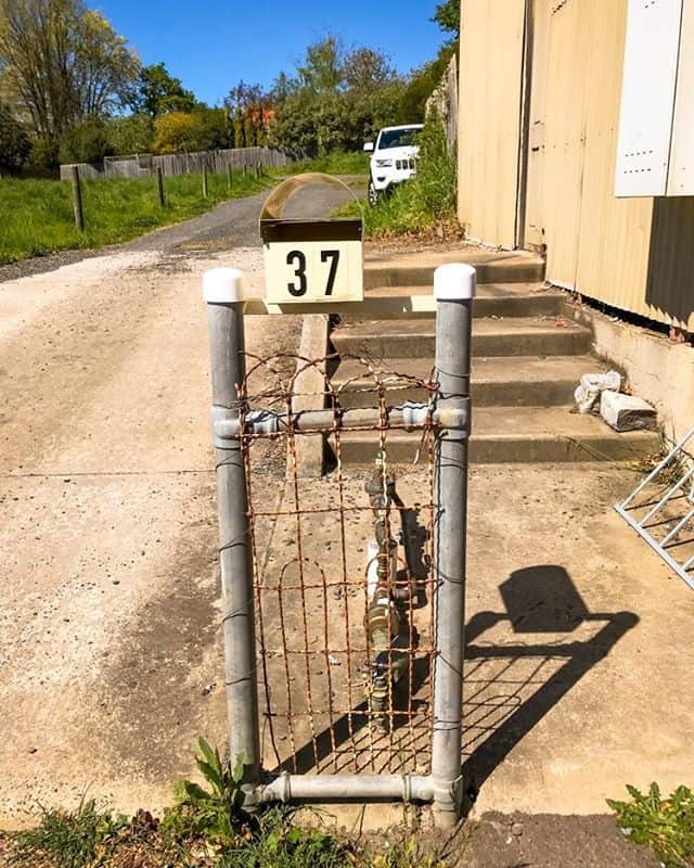 Letterbox with its very own fence