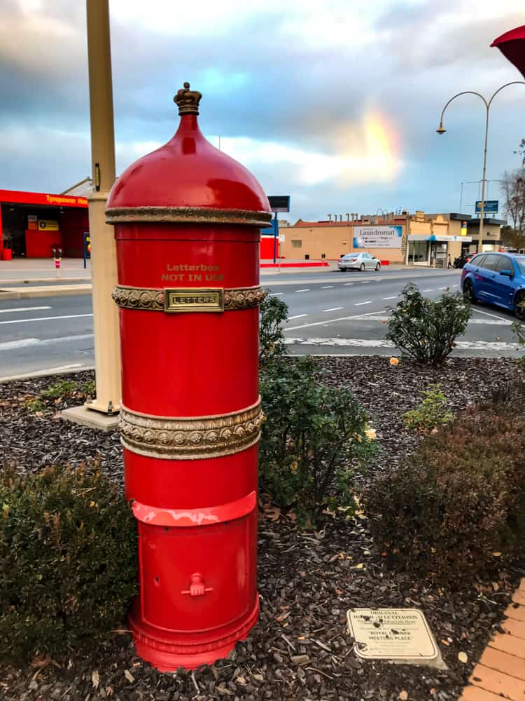 Old style letterbox in Horsham at sunset⁠